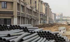 Evergrande отново избeгна фалит, но притесненията за дълга в сектора остават