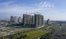 Неволите на китайския имотен сектор се задълбочават с ниските рейтинги