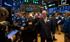 Американските акции поскъпнаха, а доларът достигна двуседмичен връх