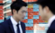 Отслабената йена подкрепи поскъпването на японските акции