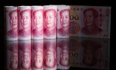 Юанът може да поевтинее с над 15% през 2016