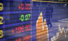 Акциите в Азия, фючърсите в САЩ поевтиняват след забавения растеж на Китай