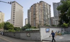 Китай може да разреши по-ранно предоговаряне на ипотеки за $5,4 трлн.