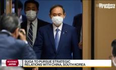 Как ще се справи Суга с търговските напрежения