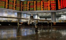 Азиатските акции поевтиняват, докато Фед планира още повишения на лихвите 