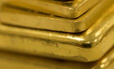 Златото поевтинява, а силата на долара надделя над търсенето на активи убежища