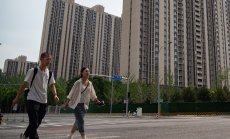 Китай иска да задължи държавните предприятия да купуват жилища