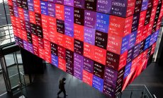 Бруталната година на пазарите завършва с колеблив ръст