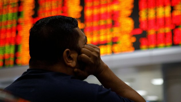 Азиатските акции отслабнаха след като акциите в САЩ паднаха а