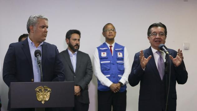 Президентът на Колумбия Иван Дук и здравният министър Фернандо Руиз Гомез. Снимка: Ivan Valencia/Bloomberg