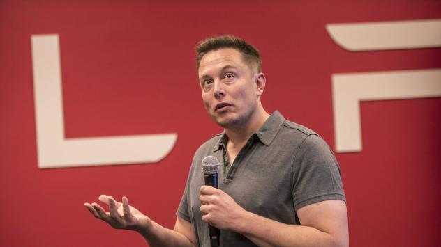 Основателят на Tesla Motors прави обръщение към публиката по време на фирмено събитие в централата в Пало Алто, Калифорния Снимка: David Paul Morris/Bloomberg 