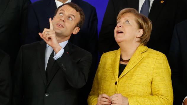 Френският президент Еманюел Макрон и германският канцлер Ангела Меркел. Снимка: Dario Pignatelli/Bloomberg